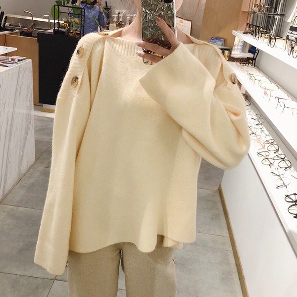 Μοντέρνα γυναικεία μπλούζα με κουμπιά σε δύο χρώματα