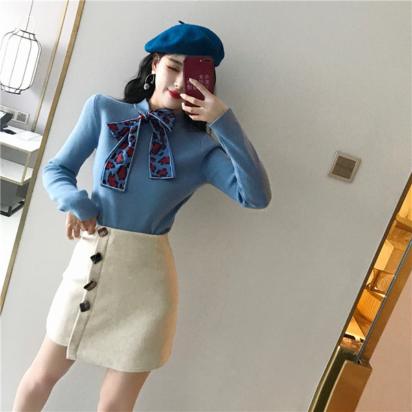 Μοντέρνα γυναικεία μπλούζα σε δύο χρώματα με κορδέλα