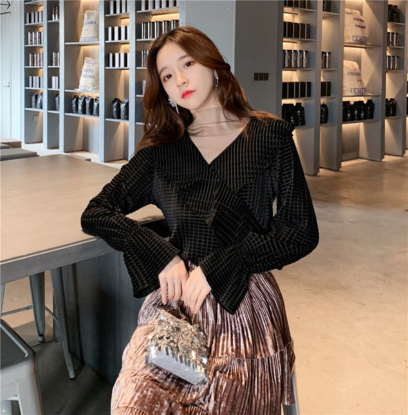 Γυναικεία κομψή μπλούζα σε μαύρο και άσπρο χρώμα