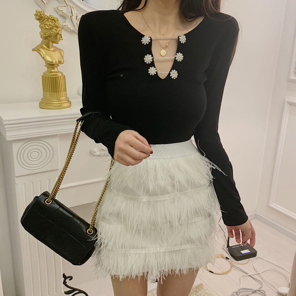 Stílusos női blúz fém elemekkel, két színben