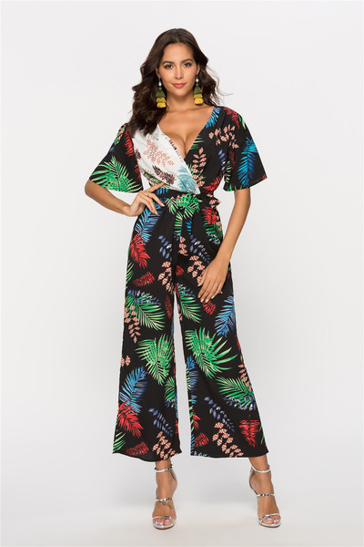 Modern női overál V-nyakú és virágmotívumokkal