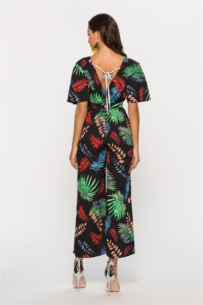 Modern női overál V-nyakú és virágmotívumokkal