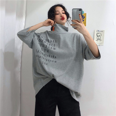 Alkalmi női blúz pólógallérral és rövid ujjú széles modellel