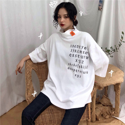 Alkalmi női blúz pólógallérral és rövid ujjú széles modellel