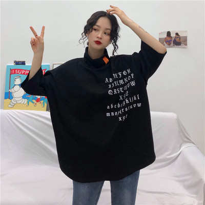 Alkalmi női blúz pólógallérral és rövid ujjú széles modellel