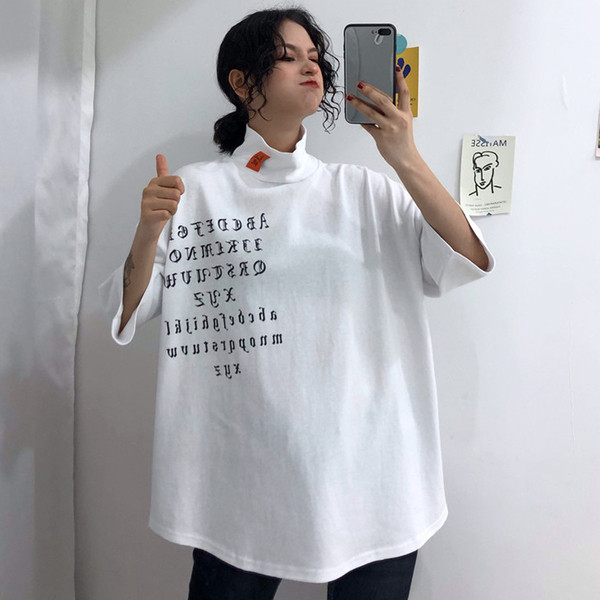 Alkalmi női blúz pólógallérral és rövid ujjú széles modellel