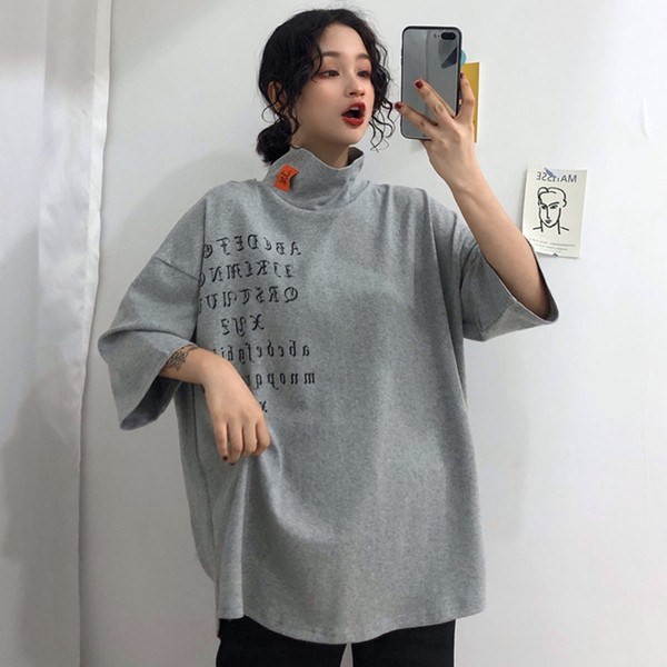 Alkalmi női blúz pólógallérral és rövid ujjú széles modellel