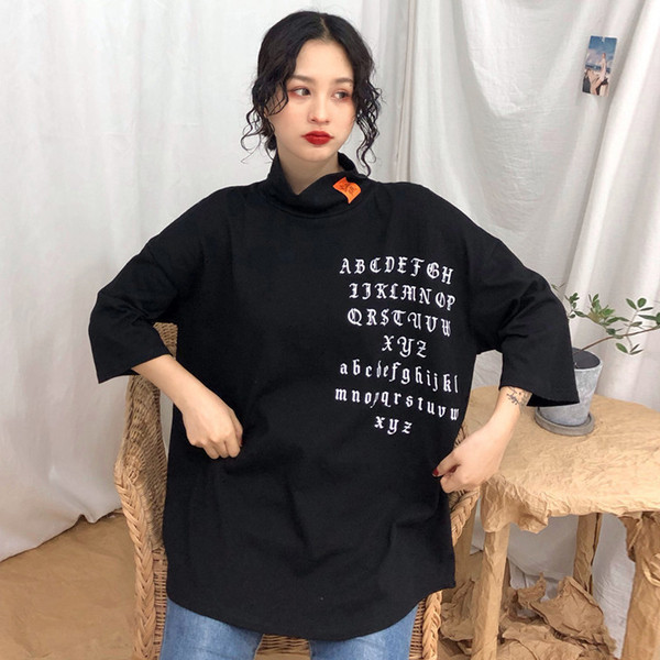 Alkalmi női blúz pólógallérral és rövid ujjú széles modellel