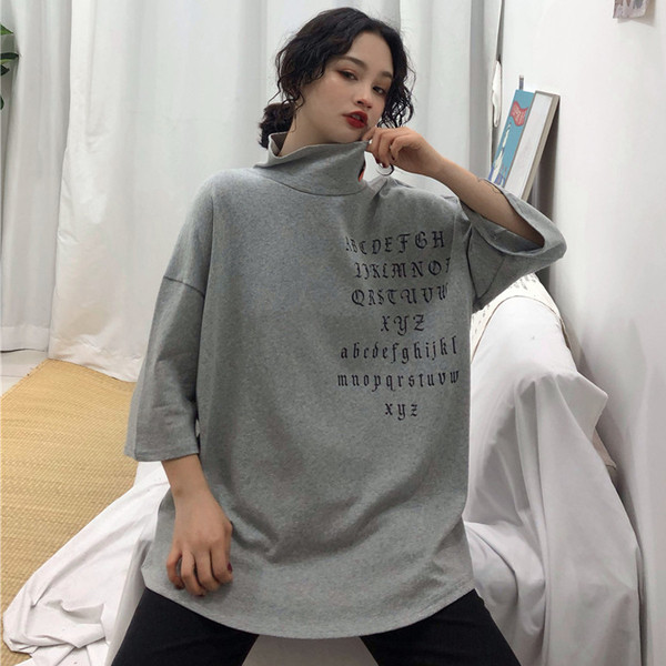 Alkalmi női blúz pólógallérral és rövid ujjú széles modellel