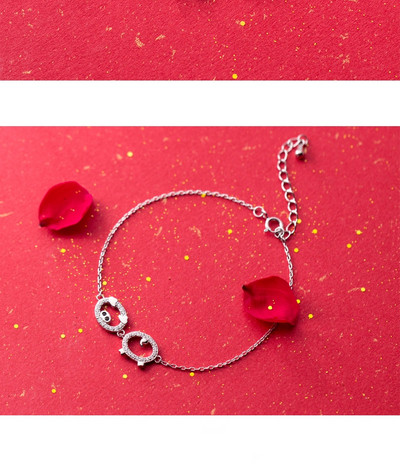 Finom női karkötő ezüst és arany színben