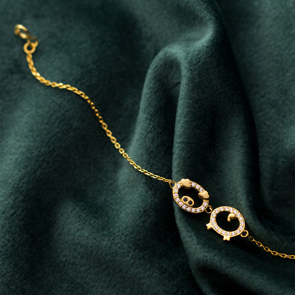 Finom női karkötő ezüst és arany színben