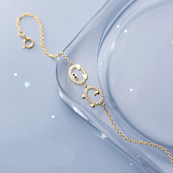 Finom női karkötő ezüst és arany színben