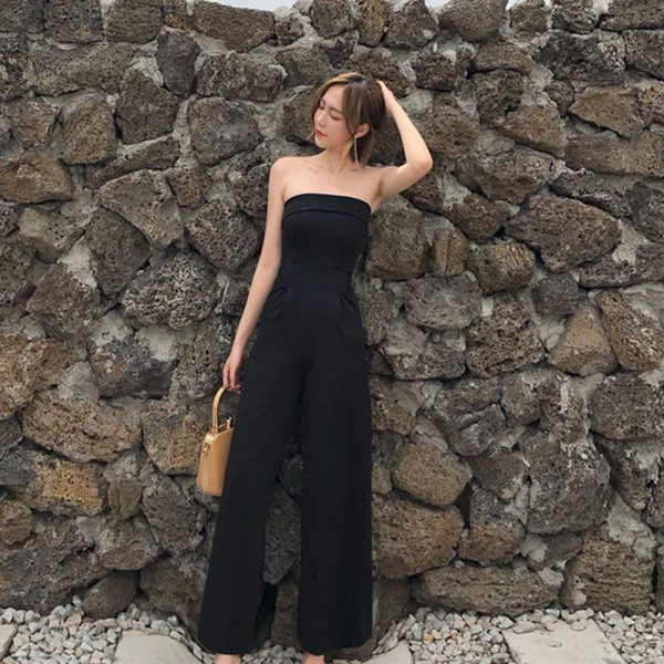 Női alkalmi ujjatlan kezeslábas fekete színben