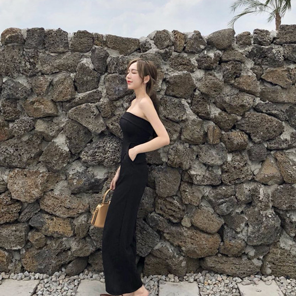 Női alkalmi ujjatlan kezeslábas fekete színben