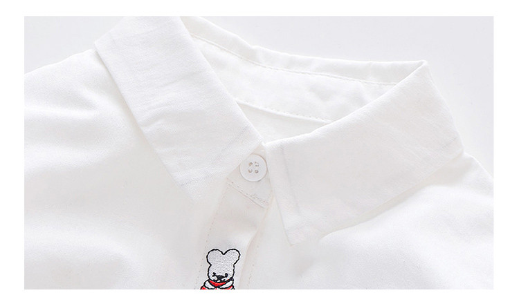 Fehér színű, hosszú ujjú, hímzéssel ellátott gyereking lányoknak