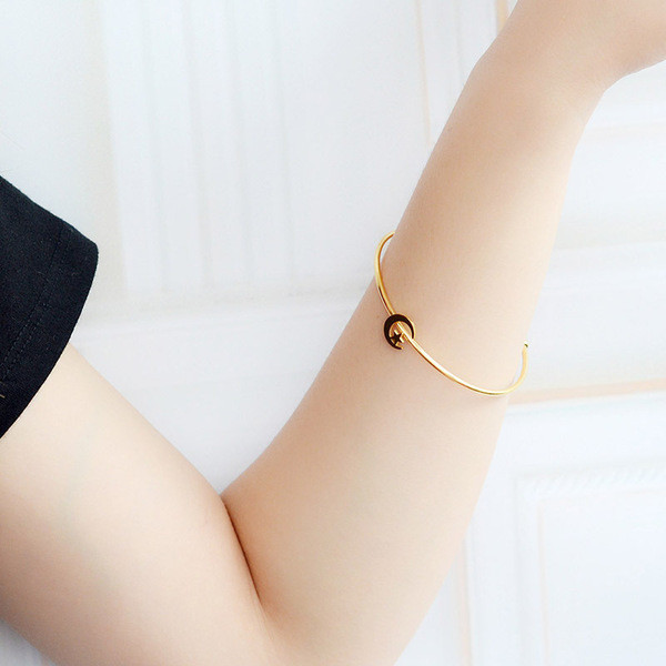 Női karkötő arany és ezüst színben