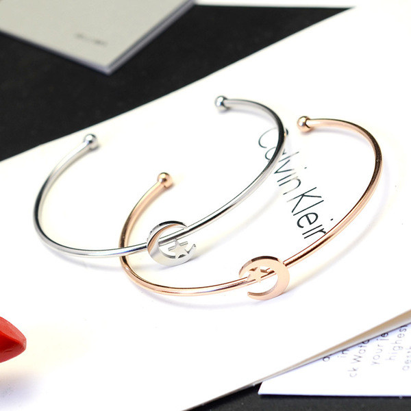 Női karkötő arany és ezüst színben