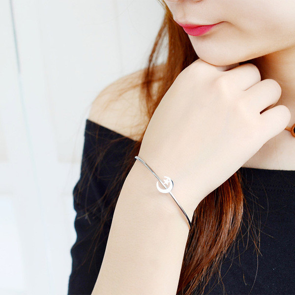 Női karkötő arany és ezüst színben