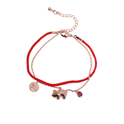 Piros és arany színű női karkötő függőkkel