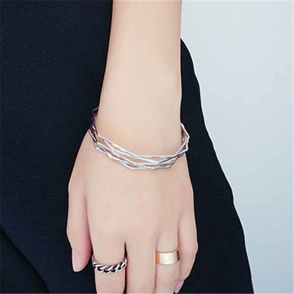 Modern női karkötő ezüst és arany színben