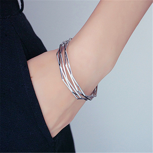 Modern női karkötő ezüst és arany színben