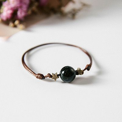 Női textil karkötő gyöngyökkel