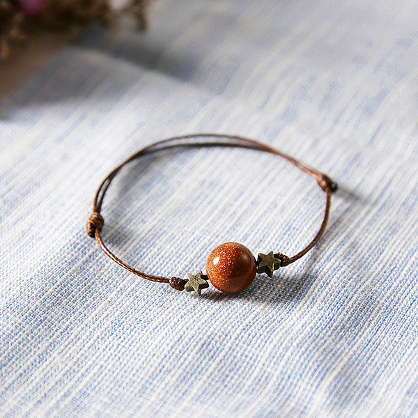 Női textil karkötő gyöngyökkel