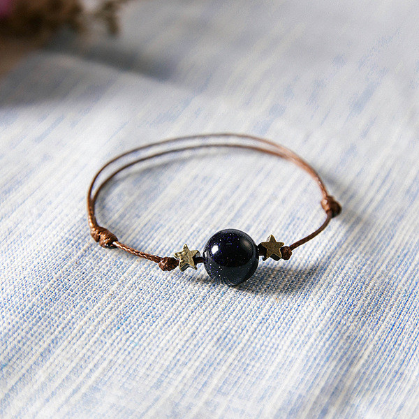 Női textil karkötő gyöngyökkel