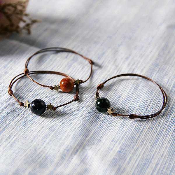 Női textil karkötő gyöngyökkel