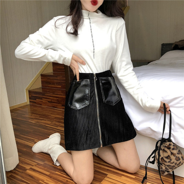 Modern női szoknya fekete és kék cipzárral