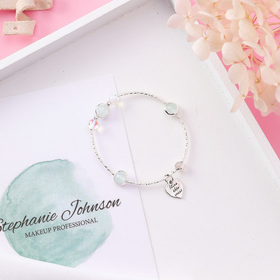 Μοντέρνο γυναικείο βραχιόλι  με κρεμαστό κόσμημα και διαφορετικό χρώμα