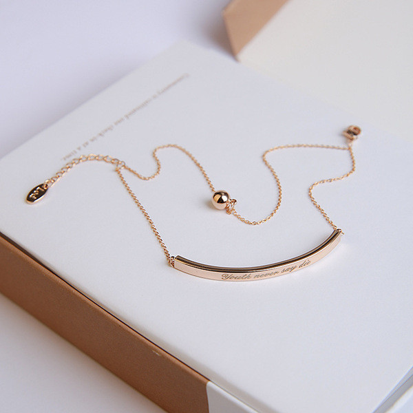 Finom női karkötő ezüst és arany színben medállal