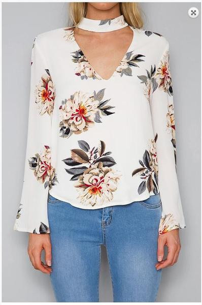 Modern női blúz virágos motívumokkal