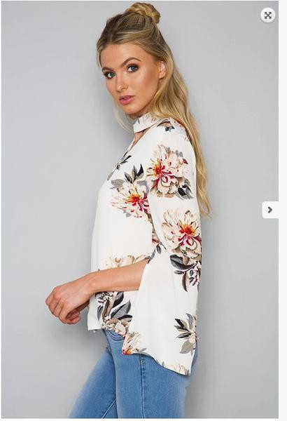 Modern női blúz virágos motívumokkal