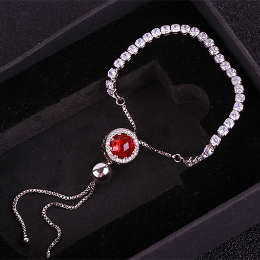 Női karkötő ezüst színben és kövekkel több színben