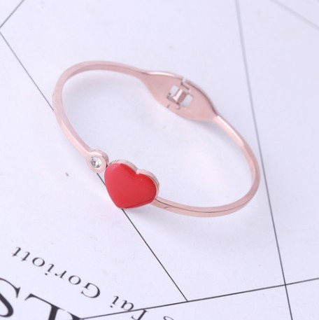 Modern női karkötő kővel, piros és fekete színben