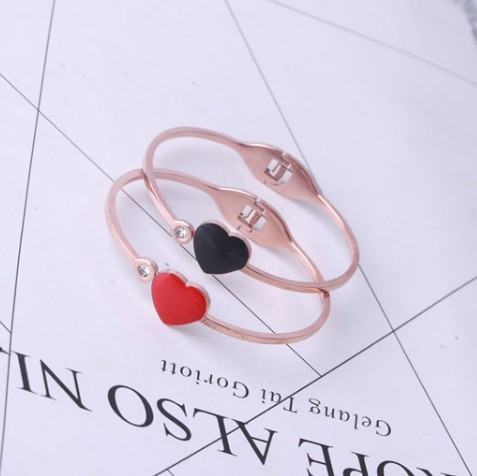 Modern női karkötő kővel, piros és fekete színben