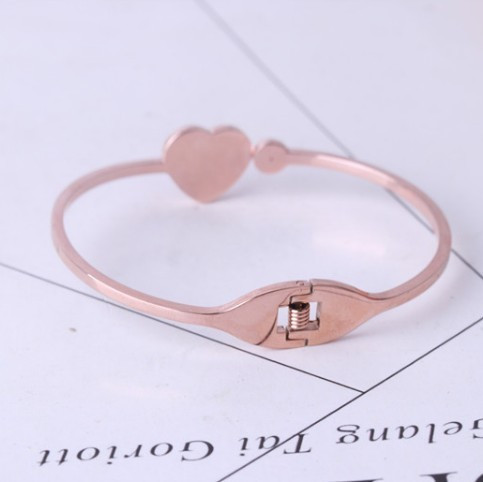 Modern női karkötő kővel, piros és fekete színben