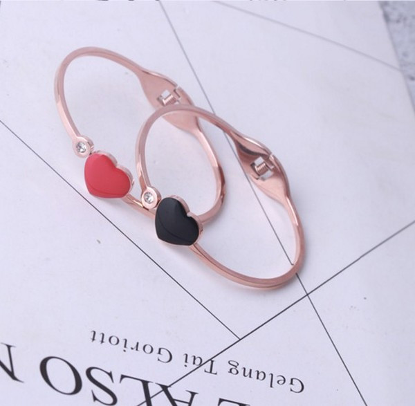 Modern női karkötő kővel, piros és fekete színben