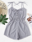 Modern női csíkos overál nyakkendővel