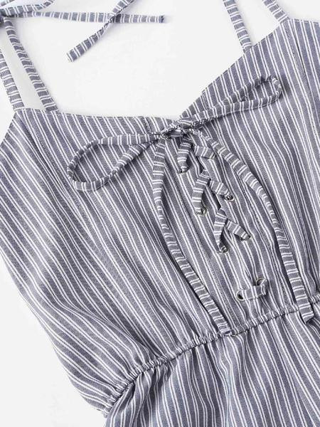 Modern női csíkos overál nyakkendővel