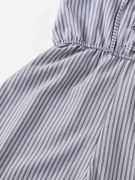 Modern női csíkos overál nyakkendővel