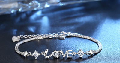 Stílusos női karkötő kövekkel, két színben