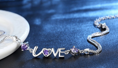 Stílusos női karkötő kövekkel, két színben