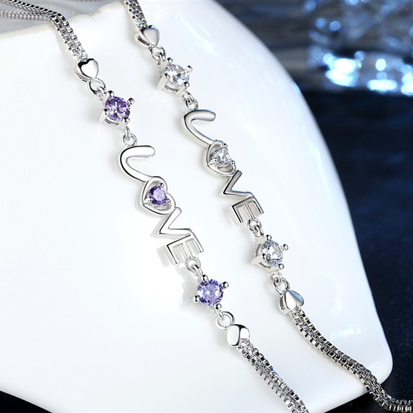 Stílusos női karkötő kövekkel, két színben