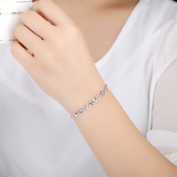 Stílusos női karkötő kövekkel, két színben