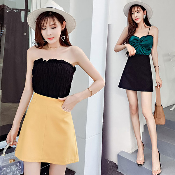 Modern női szoknya magas derékkal, fekete, sárga és fehér színekben