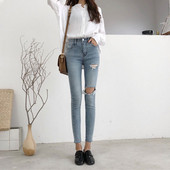 Modern női farmer magas derekú, testhezálló modellel