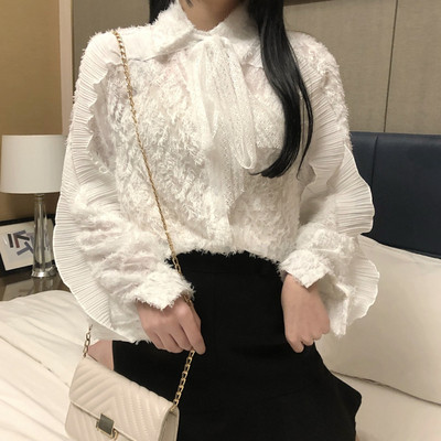 Stílusos női ing fekete-fehér színben, szalaggal