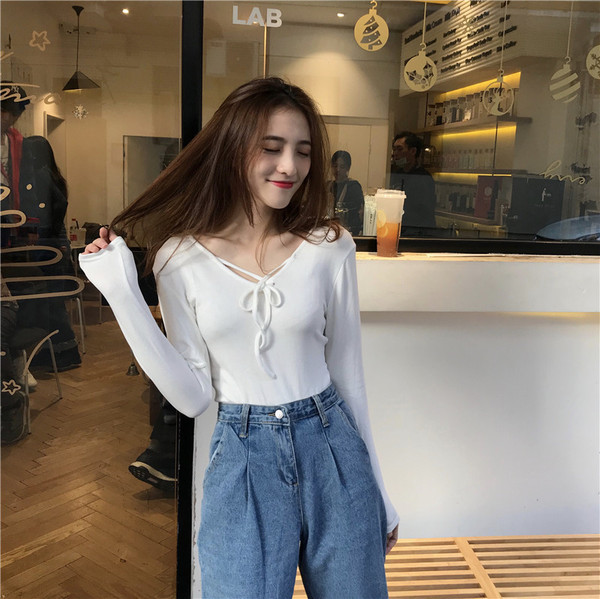 Lezser női blúz V-nyakkal több színben megkötős